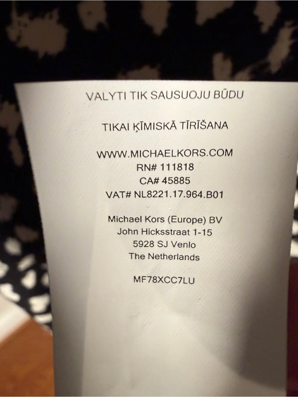Michael Kors neckline looks round